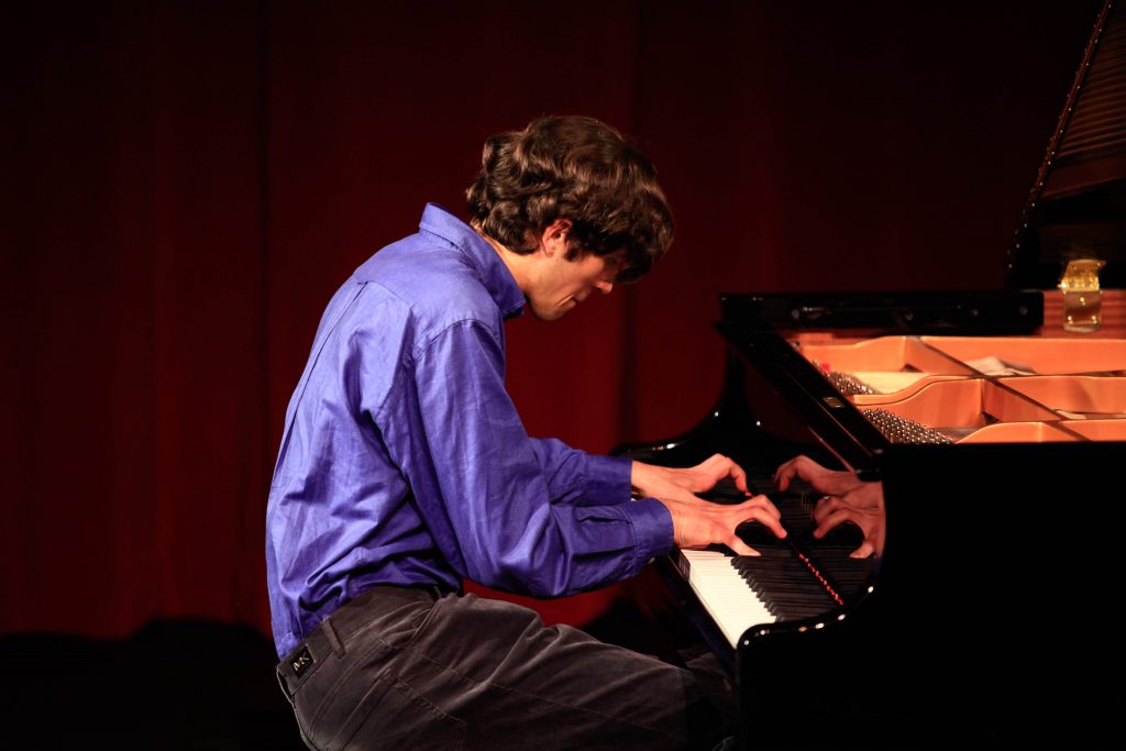 student playing piano